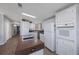 Bright kitchen features white cabinetry, a center island, and stainless steel appliances at 9416 Star Gazer Ln, Riverview, FL 33578