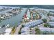Charming waterfront townhouse with dock, coastal charm, and easy access to boating and water activities at 100 Windrush Blvd # 1, Indian Rocks Beach, FL 33785