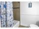 Nautical-themed bathroom features a shower over tub and decorative accents at 100 Windrush Blvd # 1, Indian Rocks Beach, FL 33785