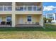 View of patio with outdoor seating at 100 Windrush Blvd # 1, Indian Rocks Beach, FL 33785