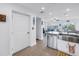 Open-concept kitchen showcases stainless steel appliances and seamless flow to the living areas at 100 Windrush Blvd # 1, Indian Rocks Beach, FL 33785