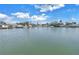 Scenic waterfront view showcasing calm waters and waterfront residences, offering a peaceful and picturesque setting at 100 Windrush Blvd # 1, Indian Rocks Beach, FL 33785