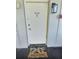 Front door with welcome mat at 1001 77Th N Ave # 206, St Petersburg, FL 33702