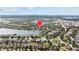 Expansive aerial perspective showcases the community nestled around lakes, and natural beauty at 10017 Smarty Jones Dr, Ruskin, FL 33573