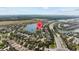Wide aerial view featuring community lakes, road access, and lush natural surroundings at 10017 Smarty Jones Dr, Ruskin, FL 33573
