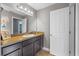 Bathroom with a vanity, mirror, and neutral decor at 10017 Smarty Jones Dr, Ruskin, FL 33573