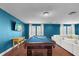 Game room with a pool table, hardwood floors, and modern decor at 10017 Smarty Jones Dr, Ruskin, FL 33573