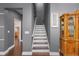 Hallway with stairs and luxury vinyl flooring at 10017 Smarty Jones Dr, Ruskin, FL 33573