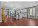 Spacious kitchen with a large island, stainless steel appliances, and modern lighting fixtures at 10017 Smarty Jones Dr, Ruskin, FL 33573
