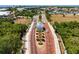 A scenic aerial view of the property's entryway, showcasing a brick road at 1025 Seagrape Dr, Ruskin, FL 33570