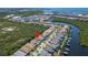 Community aerial view showcases waterways and beautiful homes in a waterfront neighborhood at 1025 Seagrape Dr, Ruskin, FL 33570