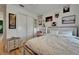 Stylishly decorated bedroom with a vanity and desk area next to the closet at 1025 Seagrape Dr, Ruskin, FL 33570