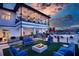 Community clubhouse featuring a covered porch with outdoor seating and a fire pit at 1025 Seagrape Dr, Ruskin, FL 33570
