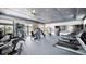 Large fitness center with modern equipment, several treadmills, stationary bikes and weight machines at 1025 Seagrape Dr, Ruskin, FL 33570
