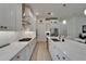 Modern kitchen with stainless steel appliances, plenty of storage, and quartz countertops at 1025 Seagrape Dr, Ruskin, FL 33570