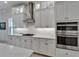 Well-equipped kitchen with stainless steel appliances and sleek countertops at 1025 Seagrape Dr, Ruskin, FL 33570