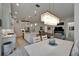Open-concept living, dining, and kitchen space with bright decor and modern finishes at 1025 Seagrape Dr, Ruskin, FL 33570
