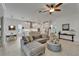 Open-concept living room and kitchen with modern decor and ample seating at 1025 Seagrape Dr, Ruskin, FL 33570