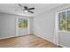 Bright, airy bedroom with lots of natural light, wood-style flooring and ceiling fan at 10265 Gandy N Blvd # 1406, St Petersburg, FL 33702
