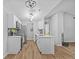 Stylish kitchen featuring stainless steel appliances, island and pendant lighting at 10265 Gandy N Blvd # 1406, St Petersburg, FL 33702