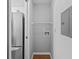 Neutral laundry area with space-saving shelving system at 10265 Gandy N Blvd # 1406, St Petersburg, FL 33702