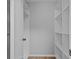 Walk-in closet with built-in shelving, providing ample storage space at 10265 Gandy N Blvd # 1406, St Petersburg, FL 33702