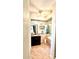 Tiled bathroom featuring granite countertops and a large mirror at 11272 Portsmouth St, Spring Hill, FL 34609