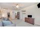 Bright bonus room offers neutral walls, a ceiling fan, and easy access to nearby bathroom at 11938 Bahia Valley Dr, Riverview, FL 33579