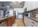 Well-equipped kitchen with a breakfast bar, stainless steel appliances, and ample cabinet space at 11938 Bahia Valley Dr, Riverview, FL 33579