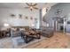 Spacious living room featuring hardwood floors, comfortable seating, and stylish decor at 11938 Bahia Valley Dr, Riverview, FL 33579