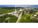 Overhead view showcasing the location's proximity to lush greenery, a major highway, and coastal waters at 1237 Savona Ne Dr, St Petersburg, FL 33702