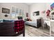 Cozy bedroom with a built-in desk, plantation shutters, and neutral decor at 1237 Savona Ne Dr, St Petersburg, FL 33702