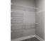 Walk-in closet featuring wire shelving for maximum storage and organization at 1237 Savona Ne Dr, St Petersburg, FL 33702