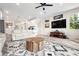 Bright living room features contemporary furniture, stylish flooring, and plenty of natural light from the windows at 1237 Savona Ne Dr, St Petersburg, FL 33702