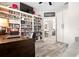Office featuring a large bookshelf, a desk, hardwood floors, and an open doorway at 1237 Savona Ne Dr, St Petersburg, FL 33702