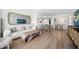 Spacious living room with comfortable seating, hardwood floors, and stylish decor at 1520 Gulf Blvd # 404, Clearwater, FL 33767