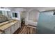 Luxurious bathroom featuring a soaking tub, walk-in shower, and granite countertops at 15209 Arbor Hollow Dr, Odessa, FL 33556