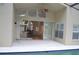 Inviting patio featuring kitchen access and access to interior living areas at 15209 Arbor Hollow Dr, Odessa, FL 33556