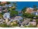 Picturesque waterfront neighborhood featuring homes with boat docks and lush landscaping, offering relaxing canal living at 1739 1/2 Bayou Grande Ne Blvd, St Petersburg, FL 33703