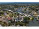 Picturesque aerial shot of waterfront properties, canals, and lush greenery in a desirable residential area at 1739 1/2 Bayou Grande Ne Blvd, St Petersburg, FL 33703