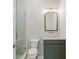 Modern bathroom with a glass-enclosed shower and stylish fixtures at 1739 1/2 Bayou Grande Ne Blvd, St Petersburg, FL 33703