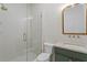 Modern bathroom with a glass-enclosed shower and stylish fixtures at 1739 1/2 Bayou Grande Ne Blvd, St Petersburg, FL 33703