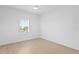 Bright and airy bedroom with wood floors, ceiling fan, and plantation window shutters at 1739 1/2 Bayou Grande Ne Blvd, St Petersburg, FL 33703