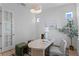 Bright home office with modern decor, plush seating, and ample natural light at 1739 1/2 Bayou Grande Ne Blvd, St Petersburg, FL 33703