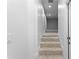 Carpeted stairway leading to another level of the home at 1739 1/2 Bayou Grande Ne Blvd, St Petersburg, FL 33703
