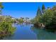 Picturesque waterfront view with lush greenery, private docks, and luxurious homes at 1739 1/2 Bayou Grande Ne Blvd, St Petersburg, FL 33703