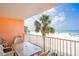 Balcony with beach view, includes a table and chairs to take in the beautiful scenery at 18400 Gulf Blvd # 1109, Indian Shores, FL 33785