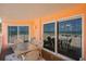 Relax on the balcony with comfortable seating and stunning views of the beach and ocean at 18400 Gulf Blvd # 1109, Indian Shores, FL 33785