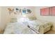 Charming bedroom featuring two beds with decorative pillows at 18400 Gulf Blvd # 1109, Indian Shores, FL 33785