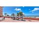 Community grilling area with multiple stainless steel grills and tables overlooking the ocean at 18400 Gulf Blvd # 1109, Indian Shores, FL 33785